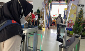 Daop 7 Hadirkan Layanan Face Recognition Boarding Gate di Stasiun Madiun